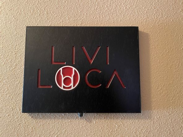 livi loca wrestler back light sign