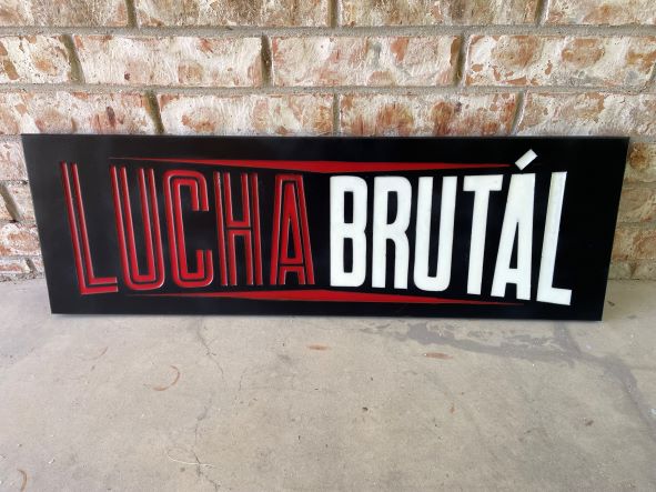 lucha brutal wrestling sign